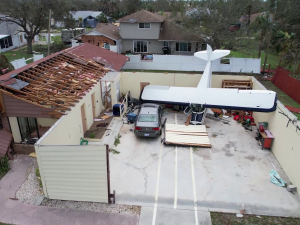 Hurricane Ian Airplane in Home Garage Drone Image